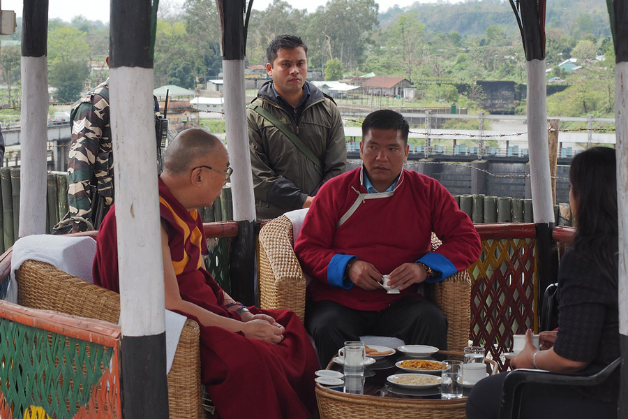 His Holiness the Dalai Lama and Arunachal Pradesh Chief Minister Pema Khandu taking a break for tea at Bhairabkunda on their journey by car to Arunachal Pradesh from Assam