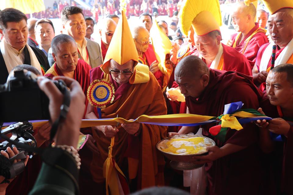 His Holiness doing the ribbon cutting ceremony at the new courtyard