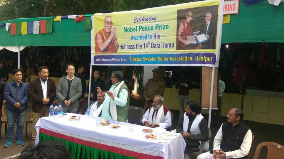 Tibetan vendors celebrating Nobel Peace prize day with Indian dignitaries