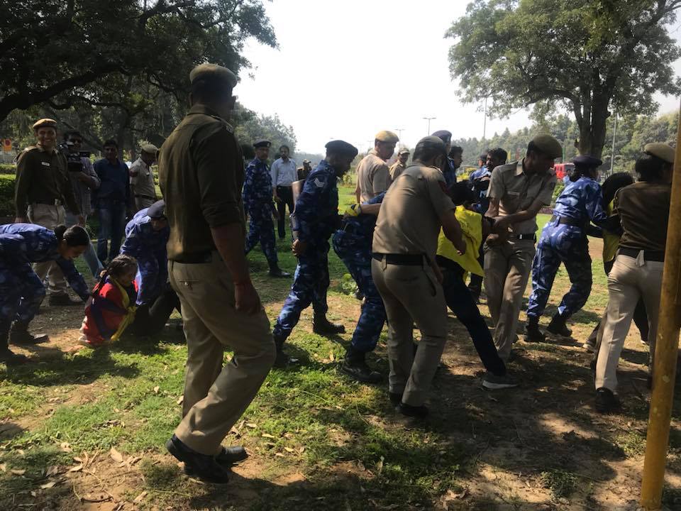 Police taking away Tibetan Activists from Chinese Embassy, New Delhi