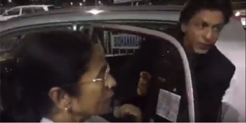 In a rare occurrence, Mamata Baneerji was caught on camera dropping the Bollywood superstar Shah Rukh Khan in her old Hyundai Santro hatchback to the airport in Kolkata. Despite the stardom of the biggest superstar of the Bollywood, he had to ride on the back seat of the old Santro car with Mamata Didi yesterday.
