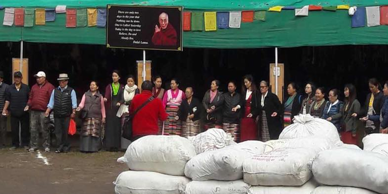 Tibetan Markets Distribute Many Woolen Items Among Poor
