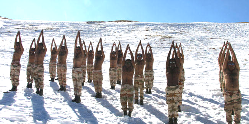Indo-Tibetan Border Police Practice Yoga in Himalayas