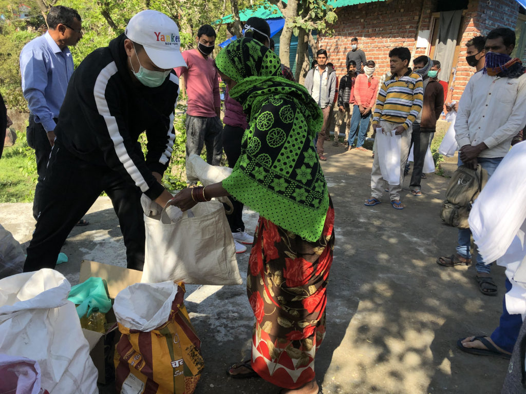 Distributing food the daily wager suffering without any income during the lockdown