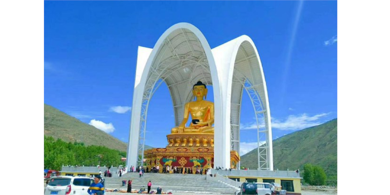 Tibetan monks have been arrested by Chinese authorities for providing information about the demolition of a Buddha statue.