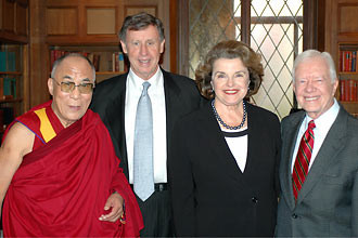 His Holiness the 14th Dalai Lama is seen with Senator Feinstein on one occasion.